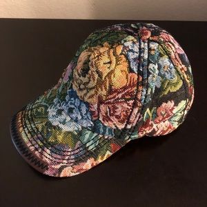 Like new, flower design, multi colored, adjustable